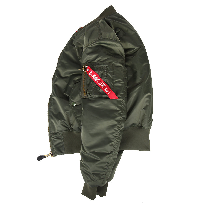 Side view of the green flight bomber jacket with a zipped sleeve pocket and red pull tab
