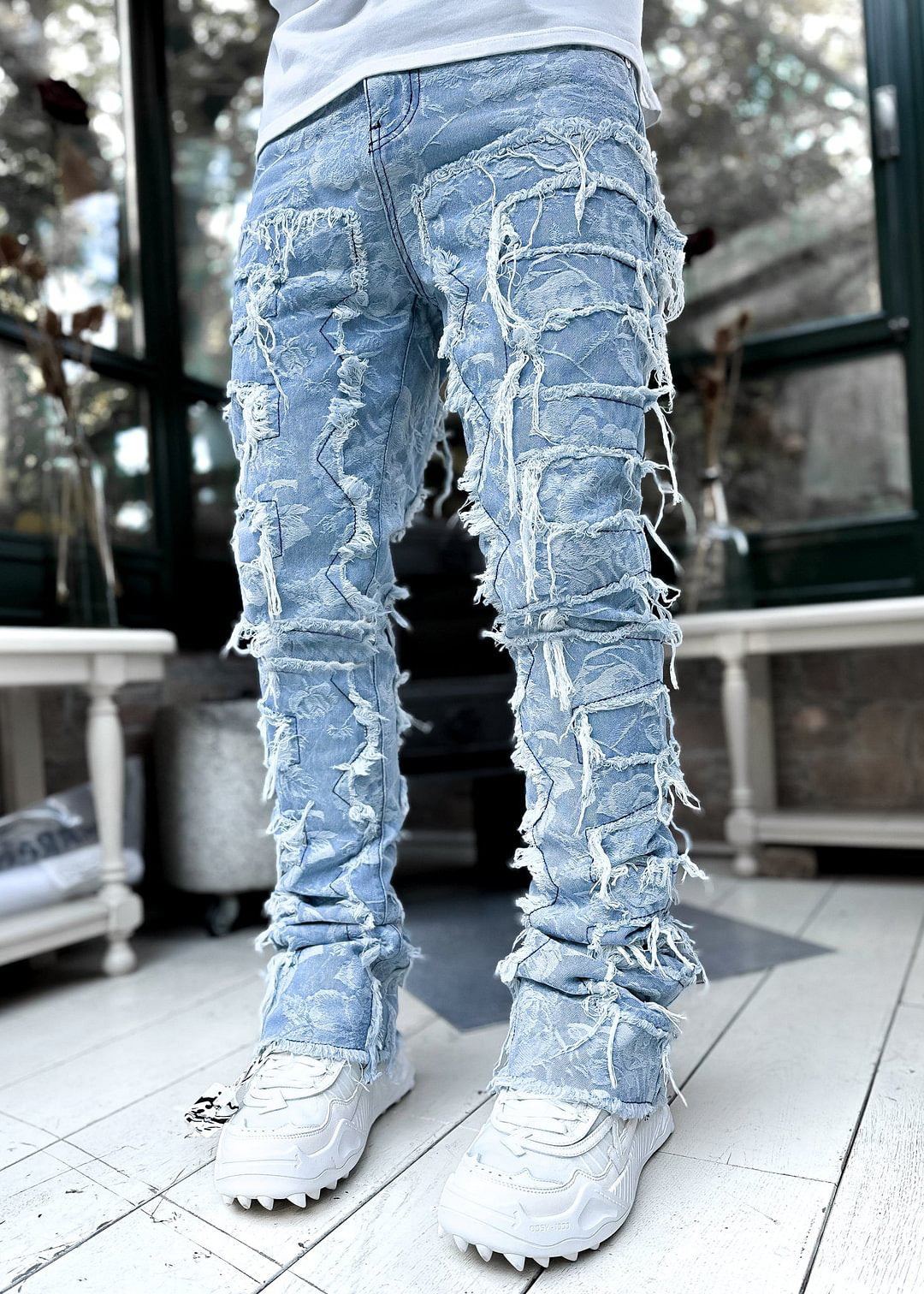 Ripped Fringed Stacked Jeans