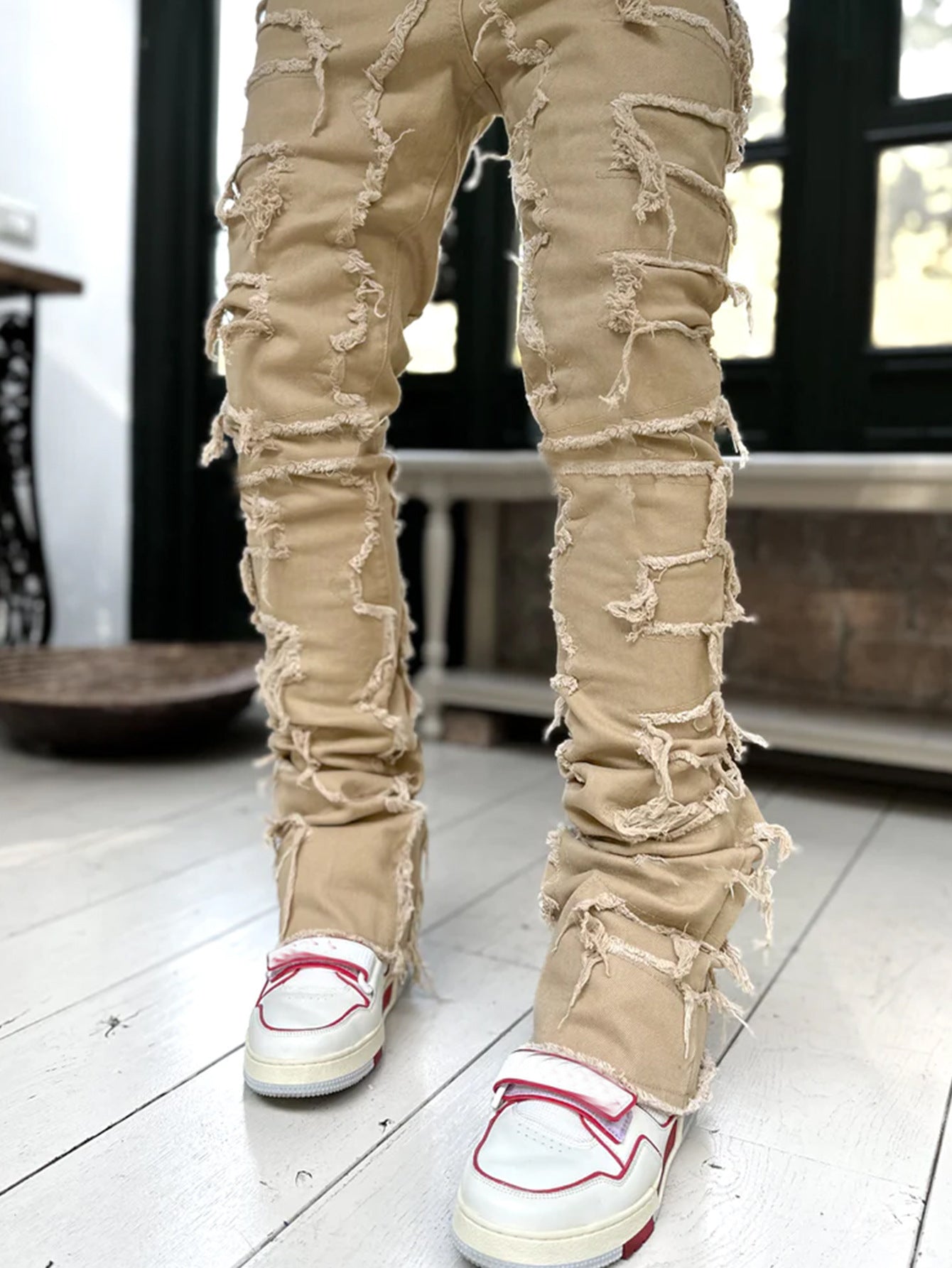 Ripped Fringed Stacked Jeans
