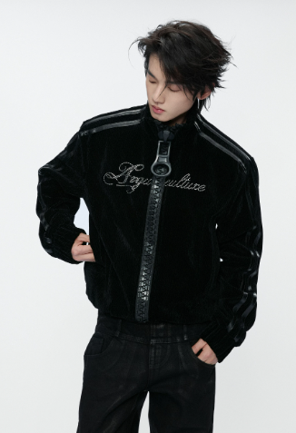 Black gothic jacket with an oversized ring-pull zip, decorative chest script and contrast sleeve stripes

