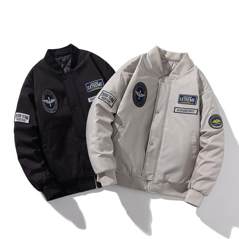 Black and Beige bomber jackets with contrasting chest and sleeve patches and ribbed trims
