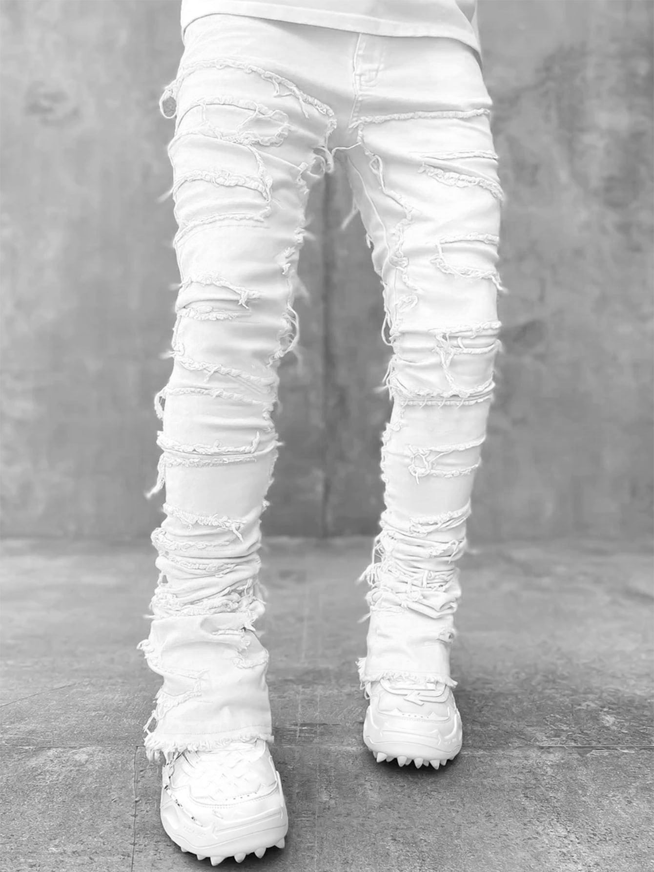 Ripped Fringed Stacked Jeans
